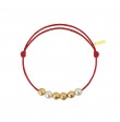 Météorites or jaune et perles blanches cordon rouge passion